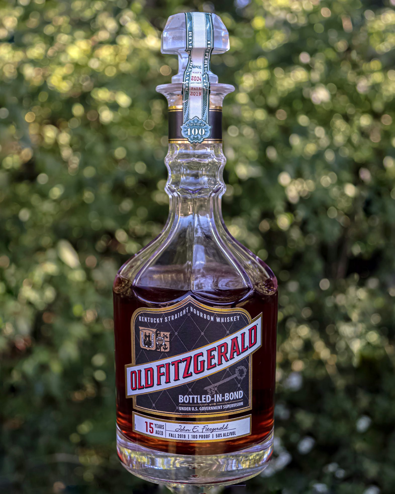 Old Fitzgerald 15 with an outdoor background.