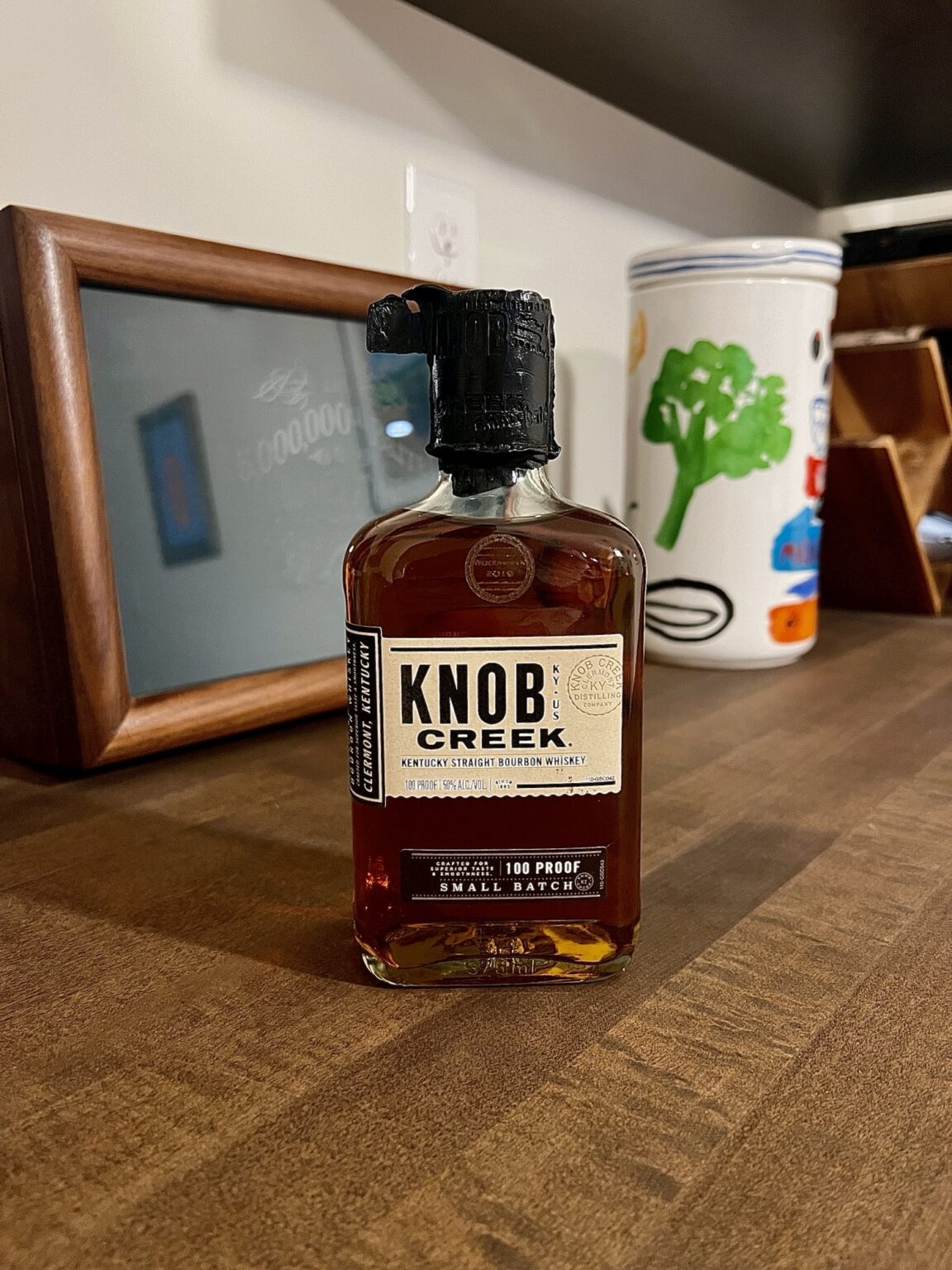 Knob Creek sitting on a bar back
