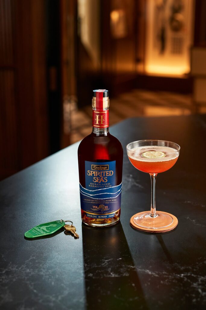 Bottle with a cocktail and key