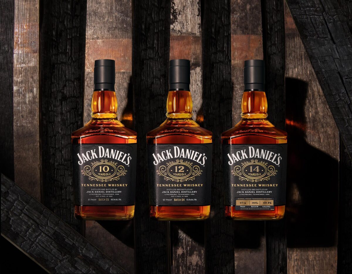 Three bottles of Jack Daniels 10, 12, and 14 on staves.