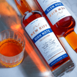 New Riff High Note 10 year bourbon and rye whiskey with a glass poured