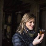 Elizabeth McCall Tasting whiskey