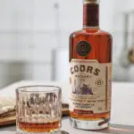 Coors America Malt Whiskey with a glass of whiskey