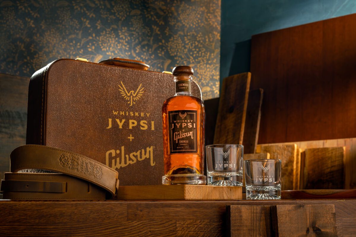 Whiskey JYPSi x Gibson displayed on table